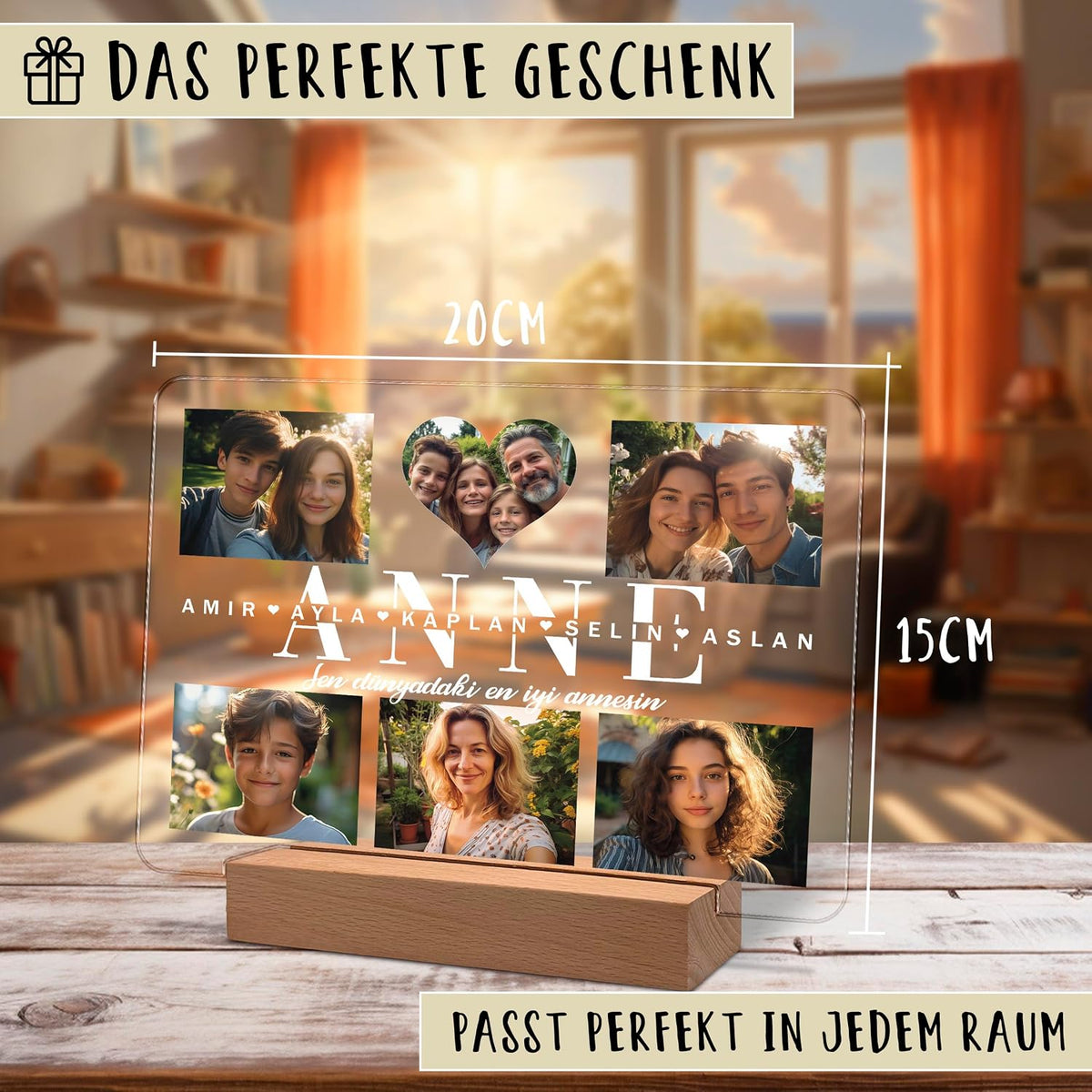 Klares Acryl‑Foto‑Display‑Panel (20 × 15 cm) auf einem Holzständer, zeigt fünf Familienfotos und großen Text „ANNE“ mit den Namen Amir, Ayla, Kaplan, Selin, Aslan. Deutscher Text-Overlay: „Das perfekte Geschenk“ und „Passt perfekt in jedem Raum“.