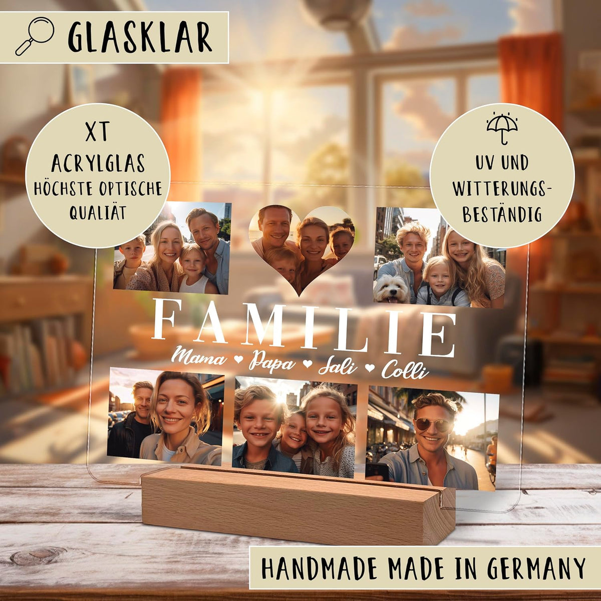 Klarer Acryl‑Fotoanzeigepanel auf Holzsockel, mit einer Familienfoto‑Collage, einem Herzausschnitt und fettem Text „FAMILIE“ sowie den Namen „Mama, Papa, Sali, Colli“. Beschriftet „Handmade Made in Germany“.